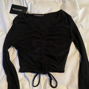 black long sleeve with ruching detail
